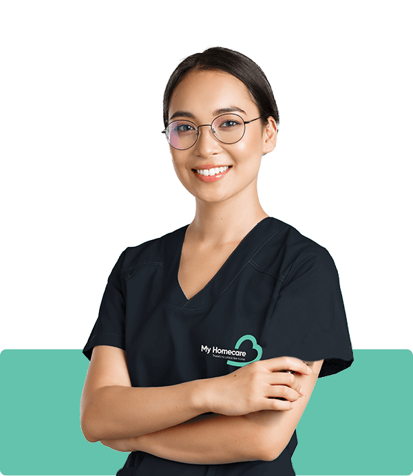 My Homecare Gloucester Carer, cross arm pose with a smile.